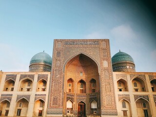 [Uzbekistan] Exterior of Mir i Arab Madrasa in Poi Kalan with blue sky (Bukhara)