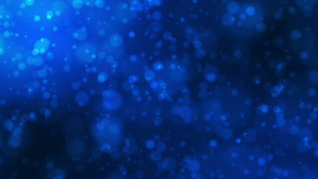 Abstract Seamless loop blue particles bokeh blink lights. Christmas light texture background. Motion graphics. Festive background. 4K Floating particles blue on dark blue endless loop footage. 