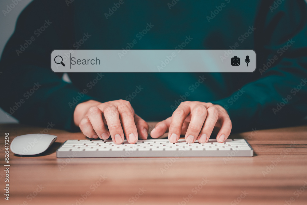 Aufkleber Freelancer's hand using a computer keyboard to search for information, job search. Business ideas for applying search to your website.