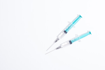 Disposable plastic syringe prepared for injection and vaccination in the hospital. The concept of medicine and health