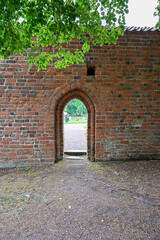 Opening in brick wall at Vadstena monastery Sweden