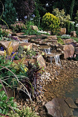 An atractive rock garden with waterfall