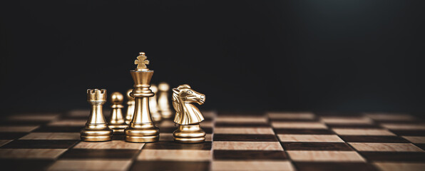 King chess stand front the line on chessboard concept of challenge or team player or business team...
