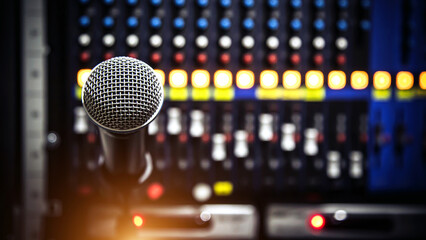 Close up microphone and blur sound mixer background for studio editor record and broadcasting producer live the media concepts. - obrazy, fototapety, plakaty