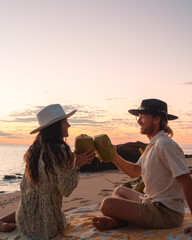 Romantic beach date with coconuts - Whitsundays.