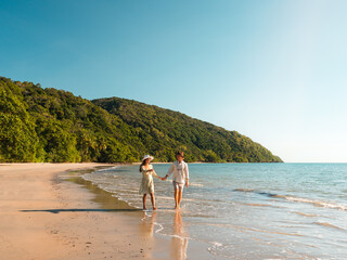 couple walking on the beach