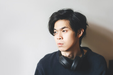 Headshot portrait of young adult asian men in japanese look with black short hair