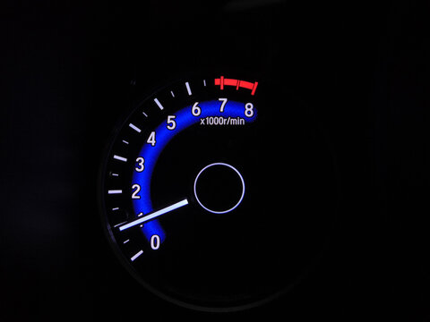 speedometer on black background