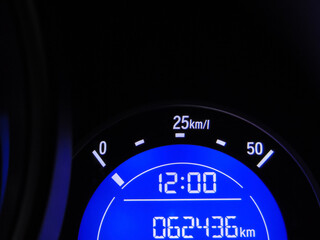 speedometer on black background