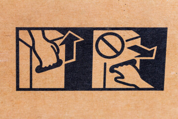 Packaging symbol to indicate not to pull the package and proper war way is to lift and carry the package. Do not pull