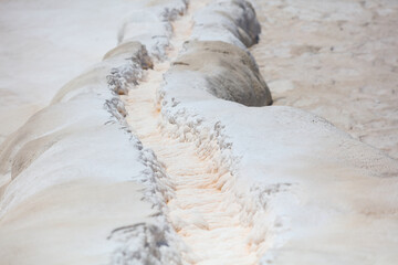 Stream in white volcanic rock.