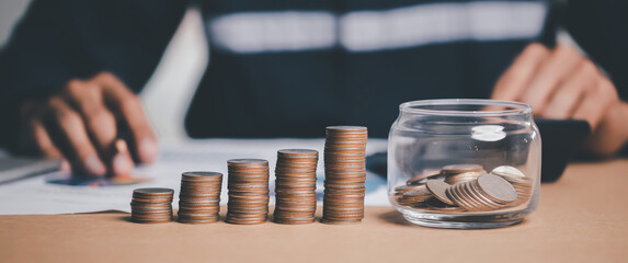 Businessman saving money concept. idea for save or investment.  and invest for growth in future.