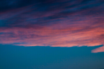 cloudy sunset with orange and pink clouds