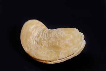 raw cashew nut on black background