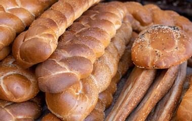 Long fresh baked Challahs for sale at the city farmers market
