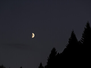 full moon over the mountains