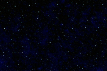 Starry night sky background.  Glowing stars in space.  Night sky with plenty shiny stars.  Photo can be used for the concept of New Year, Christmas and all celebration backgrounds.