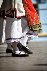 Traditional greek costume detail during a dance performance