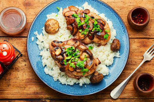 Chicken breast with marsala sauce and rice