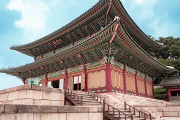 Fototapeta premium Colorful traditional wood Korean architecture temple kings throne room building main hall at Changgyeonggung Palace in Seoul South Korea 