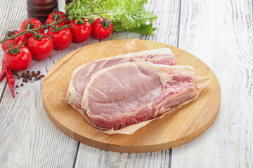 Raw pork t-bone steak for grill