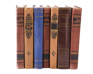 Stack of old books isolated on white background. Library shelf. The book is in a cloth cover....