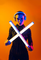 Beautiful woman with stylish clothes - Futuristic portrait of young female with colorful lighting,...