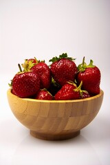 Organic strawberry on white background. Red fresh strawberry.