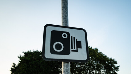 camera speed limit sign on the road