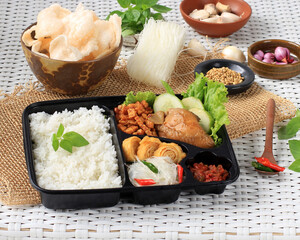 Rice Box, Nasi Berkat, Indonesian Nasi Kotak with Soy Sauce Chicken, Oreg Tempeh, and Spicy Paste
