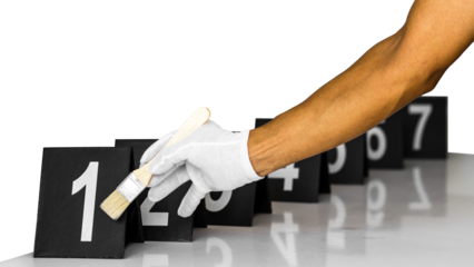 Forensics gloves holding a paint brush to label a figure which ranged respectively