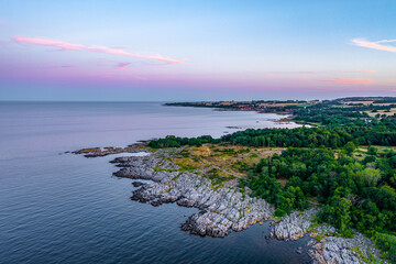 aerial view on northern coastline of Bornholm during dawn, Denmark