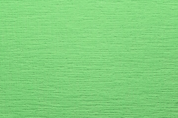 Beautiful green background with paintable wallpaper texture after painting wallpaper green