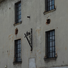 Fototapeta na wymiar old house with windows in europe town