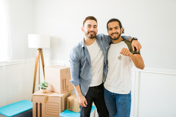 Cheerful gay couple buying a house together