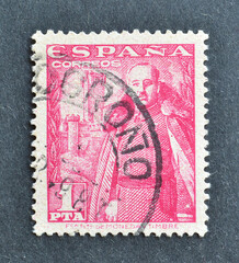 Cancelled postage stamp printed by Spain, that shows General Franco Caudillo, circa 1954.