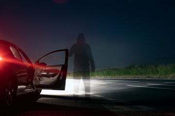 A mysterious transparent, ghost like figure, standing on an spooky empty road next to a car. On a...