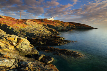 Morning light on Point Lynas Lighthouse. Anglesey, North Wales, UK.