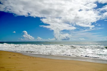 Papier peint photo Vagues de l'océan Sea waves crashing in sandy shoreline of Mahabalipuram beach, Tamilnadu. Sunny day at the beach. Private beach viewed from the resort.  © Prabhakarans12