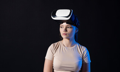 Portraite of brunette woman Architect worker wearing VR headset for working design of new architectural project. Technology futuristic virtual reality design.