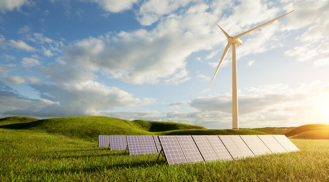 Photovoltaikanlage auf grüner Wiese mit Windrad im Hintergrund