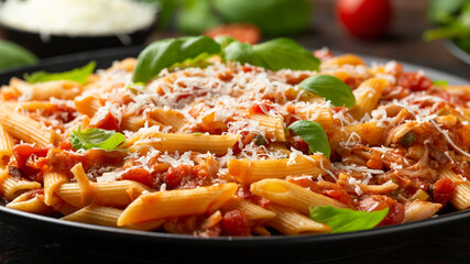 JackFruit pasta with garlic, olives, capers, tomato and cheese. Healthy vegan, diet food