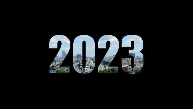 Happy new year 2023 on time lapse of cityscape background.