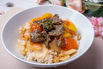 Delicious Korean style dish Steak over rice