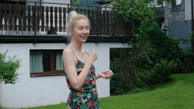 Woman holding keys of the new house.