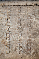 An ancient Roman game-stone carved in the floor. Didyma, Aydin, Turkey