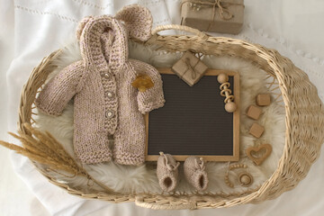 Mockup of white baby bodysuit shirt with basket, Winter Social Media Pregnancy Letter Board...
