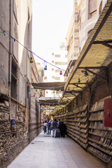 Beautiful historical street with book trade in Coptic Cairo, Egypt