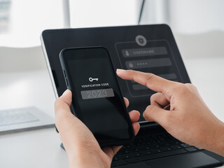 Two steps authentication or 2FA concept. 2023 Verification code with key icon on smart phone screen...