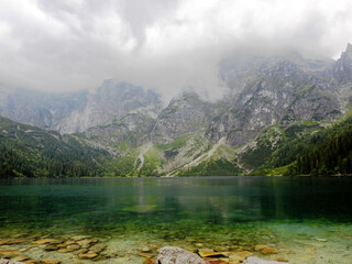 lake Morskie Oko in the mountains in Poland - obrazy, fototapety, plakaty